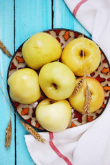 apples on a blue board, top view