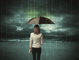 Business woman standing with umbrella data protection concept