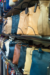Leather handbags collection in the store.