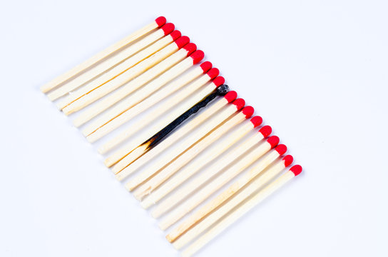 red matches on white (one match burned)