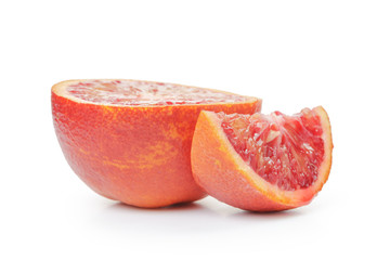 half of ripe blood red orange and segment isolated