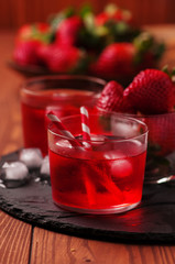 Fresh strawberry cocktail on the wooden table