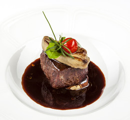 grilled fillet steak served with tomatoes