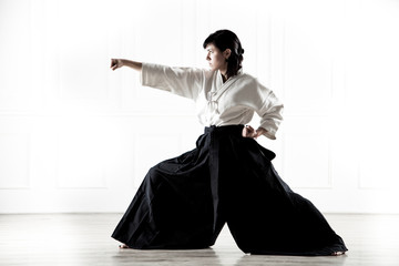 beautiful woman wearing a hakama engaged in kung Fu 4 © operator1975