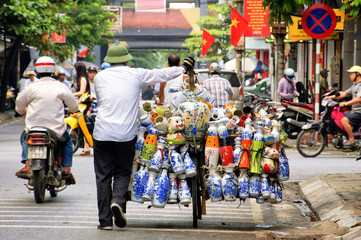 Life of vietnamese street vendor in  - obrazy, fototapety, plakaty