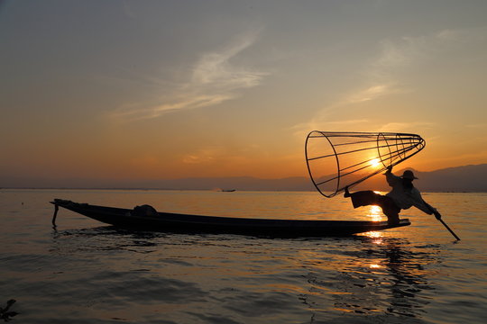 sunset and fisherman at inle lake