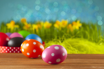 Colored Easter eggs on blue background
