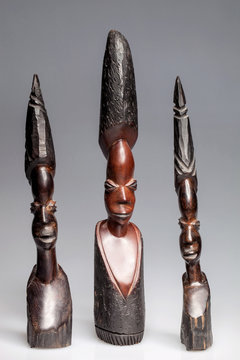 African wooden statuettes of women