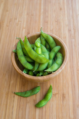 Japanese green soy bean on the wooden table.