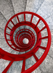 Spiral stairs with red balustrade