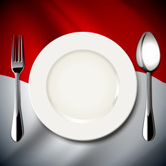 White plate with spoon and fork on Indonesia flag background