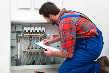 Technician servicing the underfloor heating