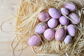 Easter eggs in a straw nest