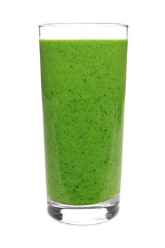 Green Smoothie In A Glass Isolated On A White Background