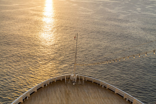 Cruise ship at sea during sunrise