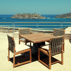 Terrace seaview with outdoor furniture in a luxury resort,Crete