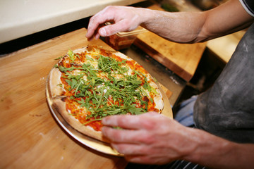 Chef Making a Brick Oven Pizza