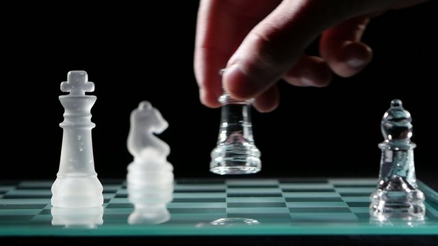 Move the elephant in chess  on black background.