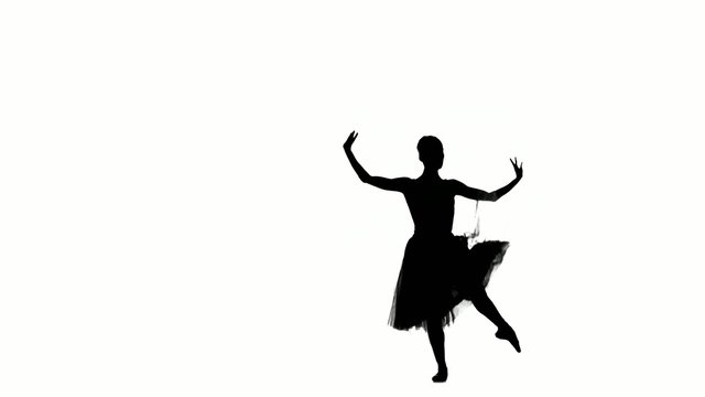 Young ballerina making dance trick, spinning and grands