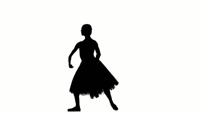 Ballerina making dance trick, entrechat, on white background