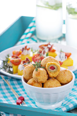 Appetizer Olives baked in cheddar dough