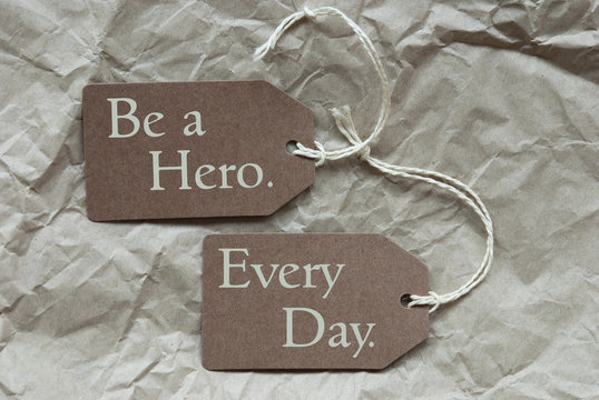 Two Brown Labels With Quote Hero Every Day Paper Background