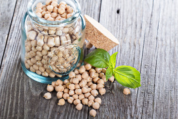 Raw chickpeas in a glass jar