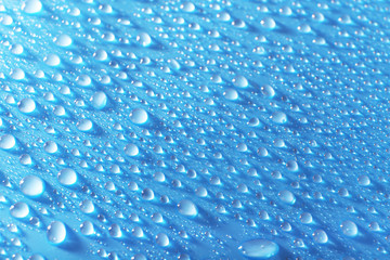 Water drops on light blue background