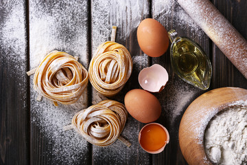 Raw homemade pasta and ingredients for pasta