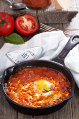 Shakshuka with tomatoes and eggs