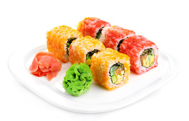 Sushi rolls on plate isolated on white