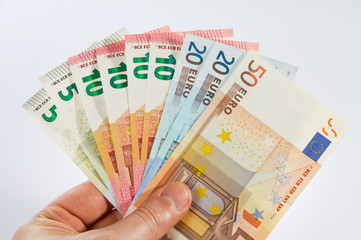 Geldf&auml;cher in der Hand