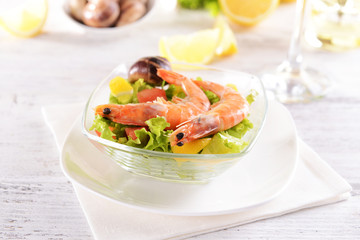Tasty seafood on plate on table close-up