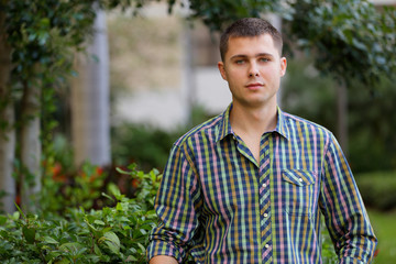 Man posing in the garden