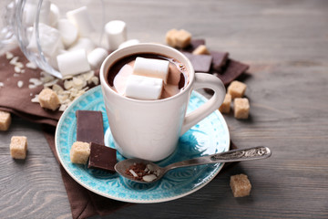 Hot chocolate with marshmallows in mug,