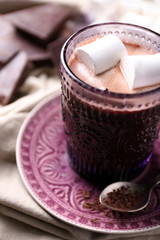Hot chocolate with marshmallows in glass,