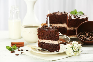 Delicious chocolate cake on table on light background