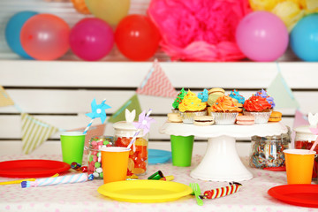 Prepared birthday table with sweets for children party