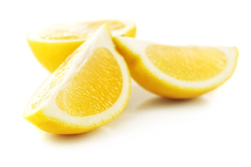Juicy slices of lemon isolated on white