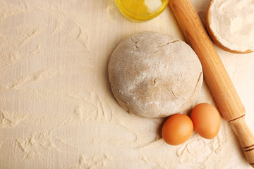 Making bread on wooden table background