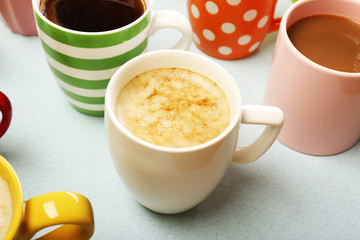 Many cups of coffee on table, closeup