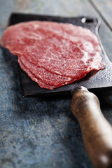 vintage cleaver and Beef Carpaccio