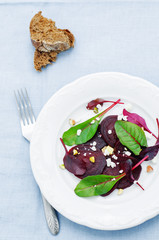 salad with roasted beets, goat cheese, mangold and pistachios