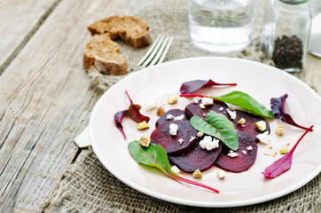 salad with roasted beets, goat cheese, mangold and pistachios