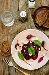 salad with roasted beets, goat cheese, mangold and pistachios