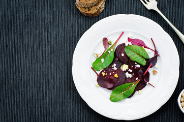 salad with roasted beets, goat cheese, mangold and pistachios