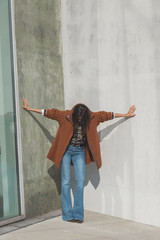 Beautiful girl posing in an urban context