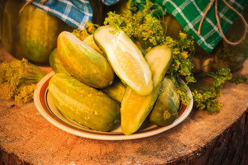 chopped pickled cucumbers plate wooden board