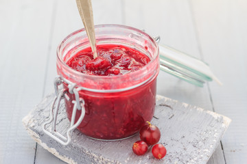 Open gooseberry jam spoon middle