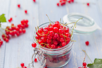 red currant fruit jar wooden table